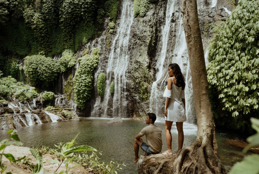 Couple at waterfall in Bali