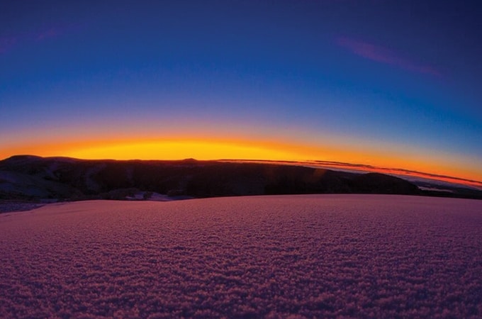 Sunset in the snowy horizon at Mt Hotham Victoria