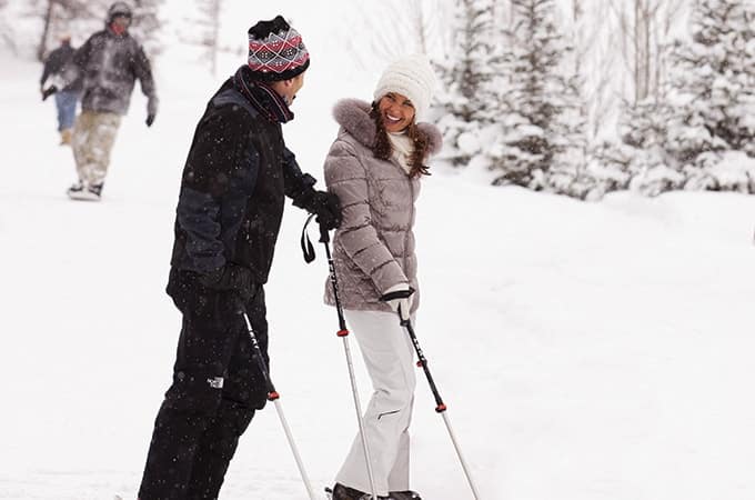 Couple skiing in VAil