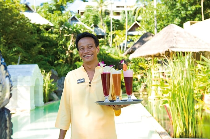 Sip green tea and healthy juices by the blue waters of the sparkling 25-metre lap pool