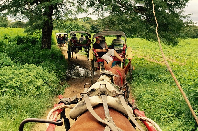 Horse-drawn carriages take you to through the temple-strewn countryside in Bagan in Myanmar