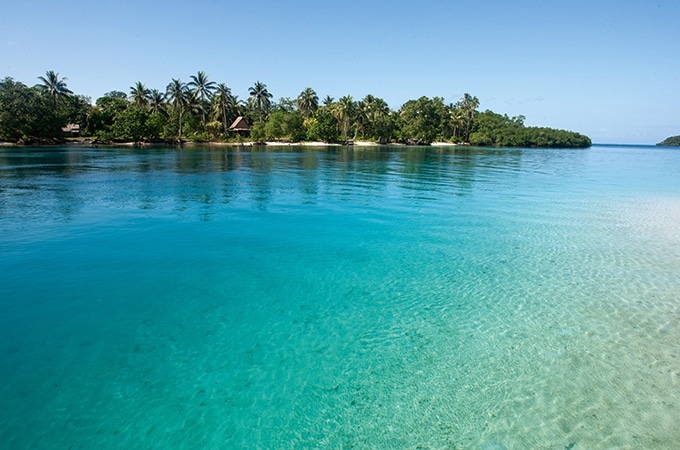 Crystal clear waters of the blue lagoons surrounding Tavanipupu