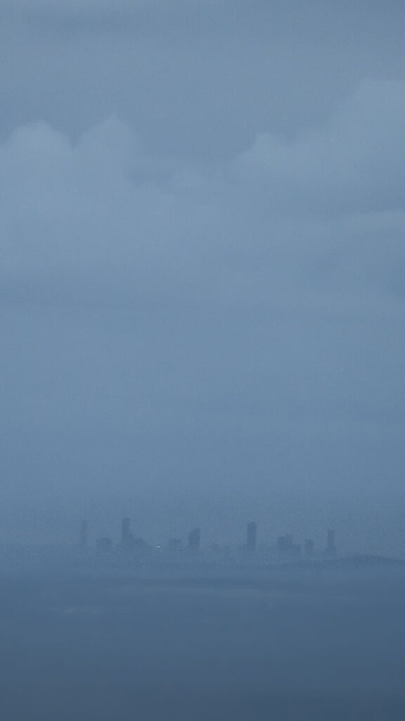 Aerial shot of foggy Brisbane from a hot-air ballon in The Gold Coast Hinterland.