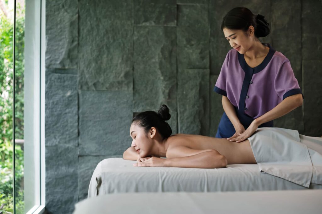 woman-being-massaged-by-a-masseuse-in-Banyan-Tree-Samui