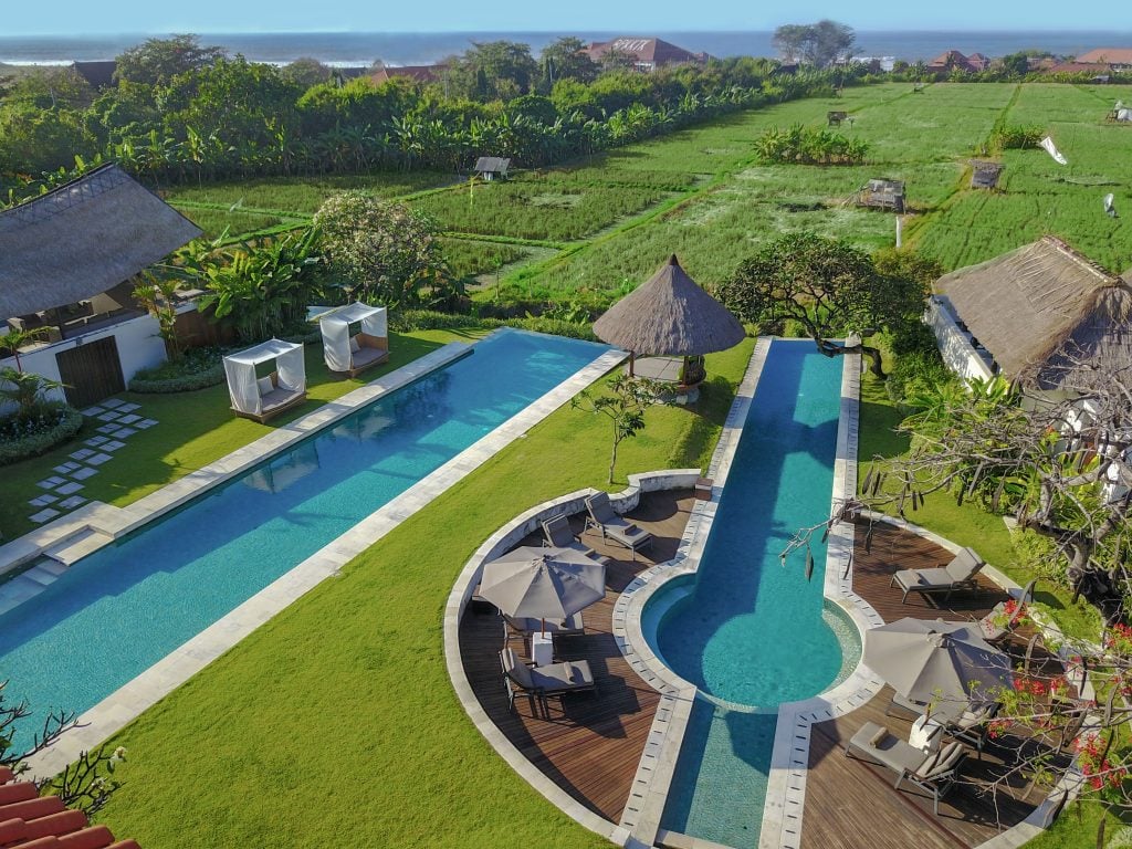 The-Samata-Sanur-Bali-panoramic-view-of-the-swimming-pools-with-ricefields-in-the-background