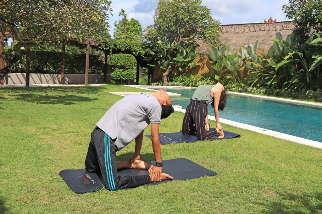 The-Samata-Sanur-Bali-couple-doing-yoga