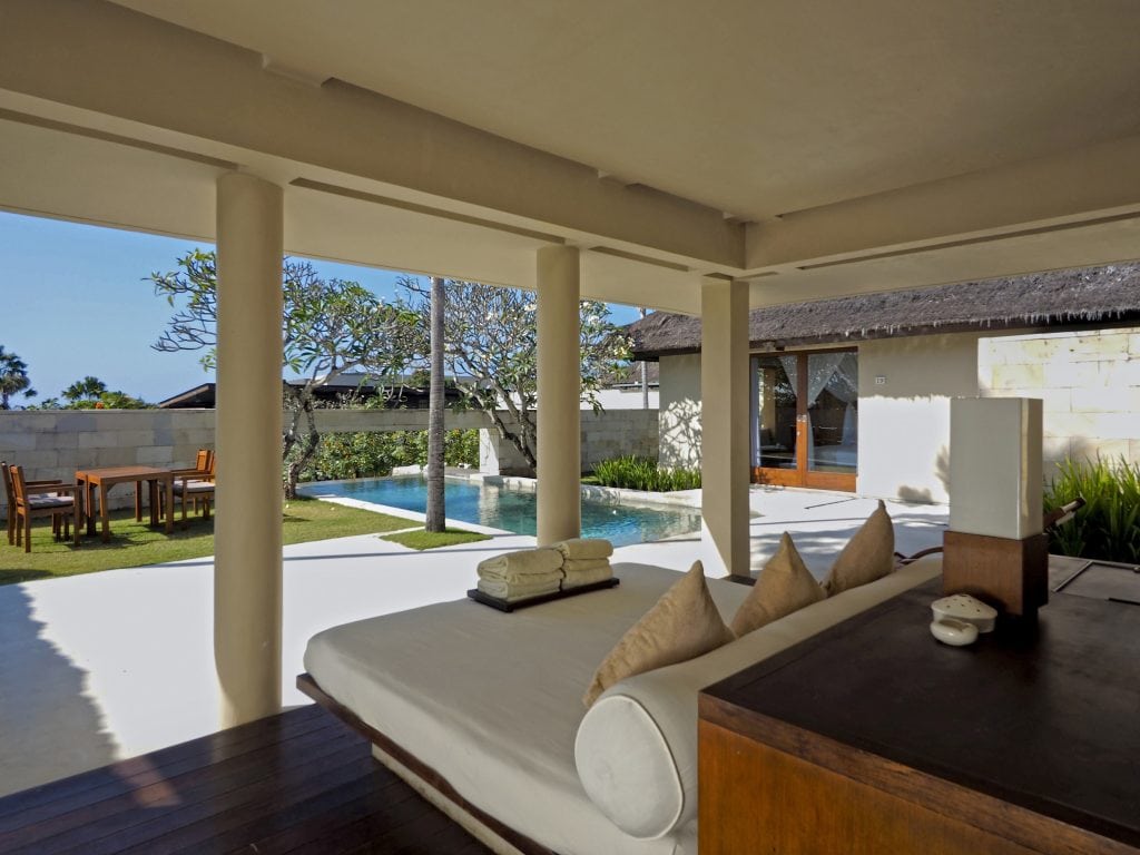 the-bale-nusa-dua-bali-double-pavilion-daybed-with-view-of-the-pool-during-daytime