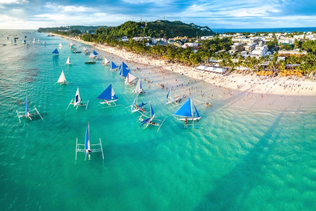 Boats and aerial beach view of Boracay, Philippines