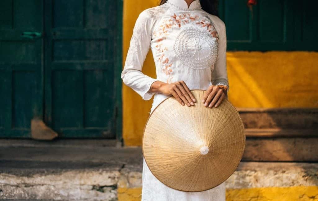 Women in traditional dress Bicycle vietnam