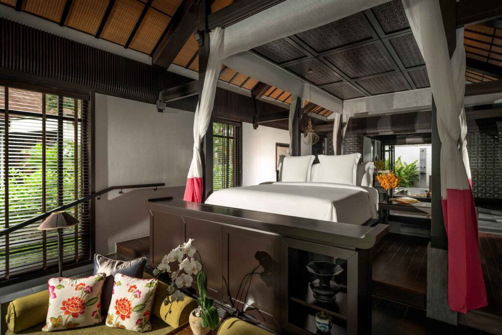 Four-Seasons-Resort-The-Nam-Hai-room-or-villa-interior-bedroom-bed