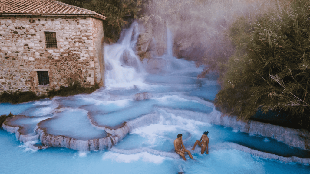 Saturnia, Tuscany Italy - couple enjoying the hot springs