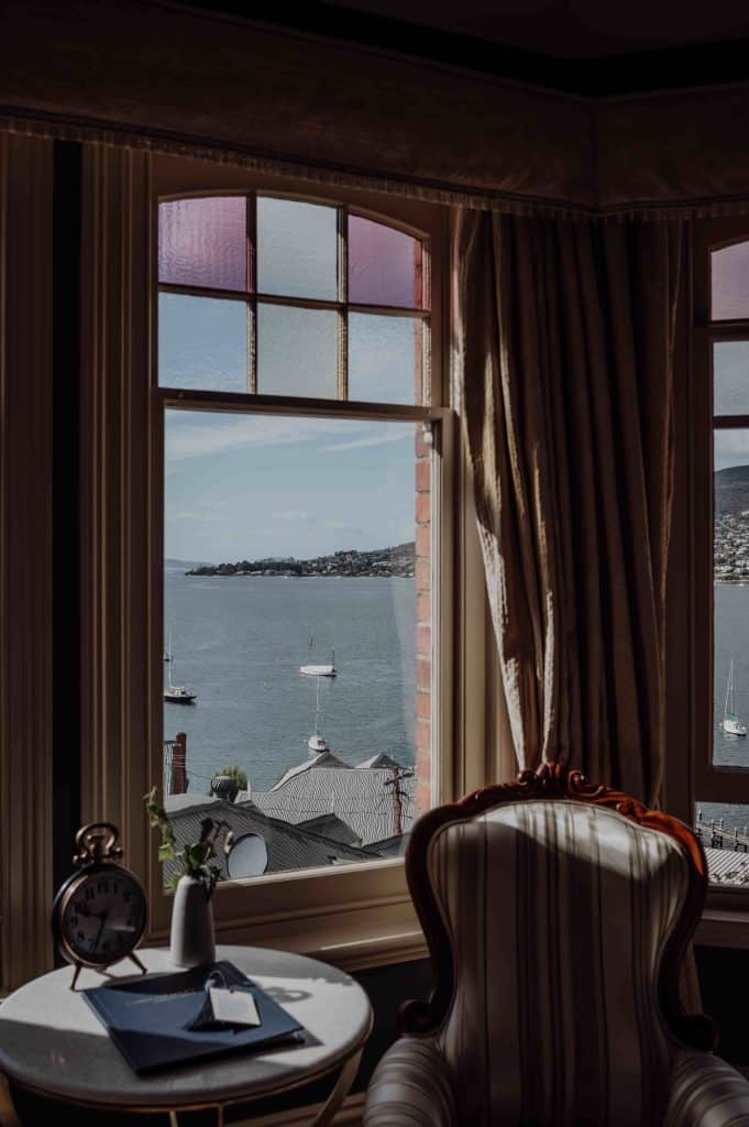 Grande Vue Private Hotel - Hobart - Australia - interior - bedroom - lounge area or seat with big window overlooking the ocean